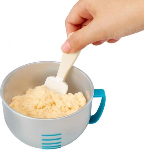 Odměrka s ryskami a špachtle pro přesné míchání