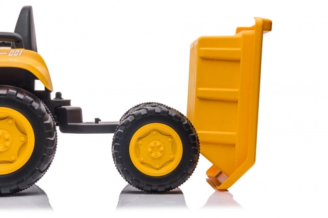 Elektrický traktor s lžící žlutý