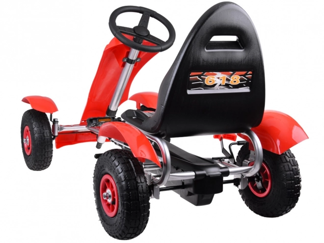 Sportovní zelený šlapací motokára s nafukovacími koly