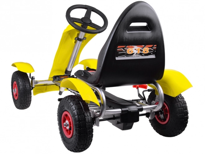 Sportovní zelený šlapací motokára s nafukovacími koly