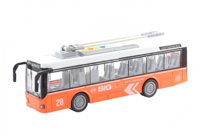 Oranžový hrající a svítící trolejbus na baterie