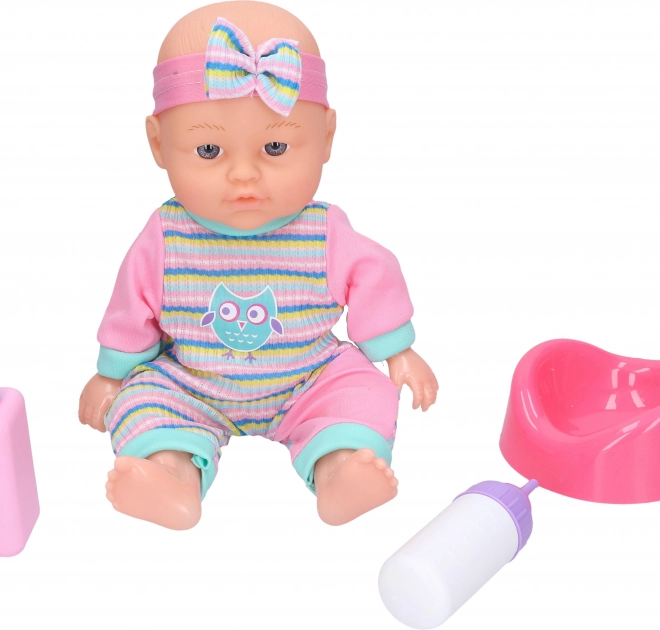 Miminko čurající se zvukovými efekty 25 cm