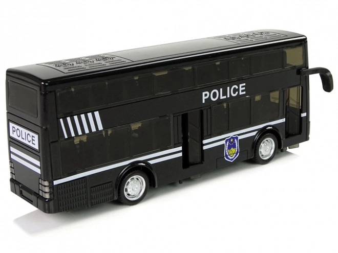 Policejní dvoupatrový černý autobus s třecím pohonem