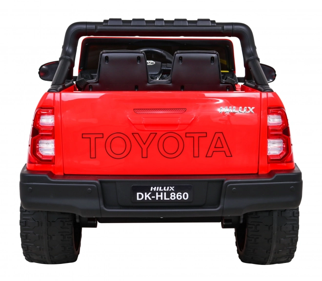 Toyota Hilux baterie pro děti Červená + pohon 4x4 + dálkové ovládání + 2 nosiče zavazadel + rádio MP3 + LED dioda