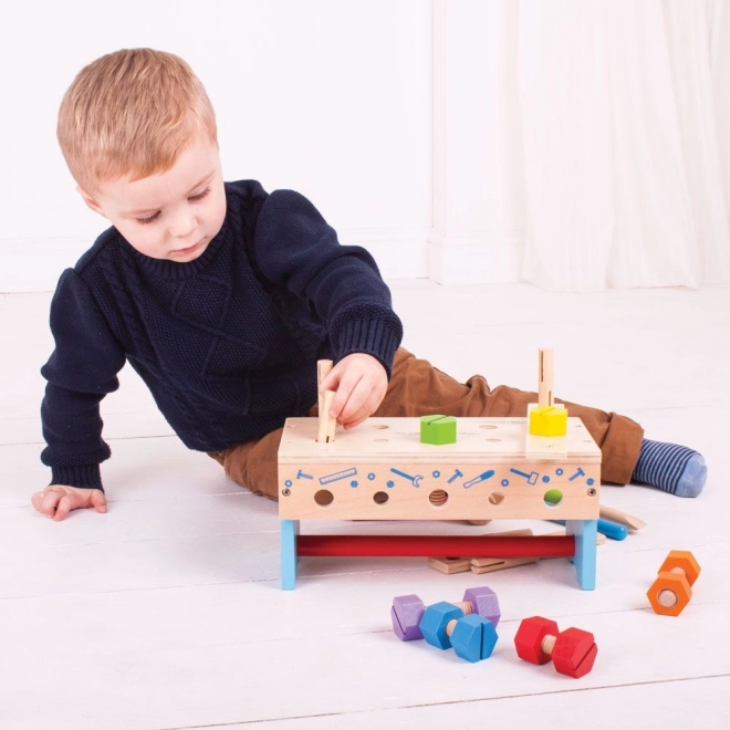 Dřevěný ponk a přepravka na nářadí 2v1 Bigjigs Toys