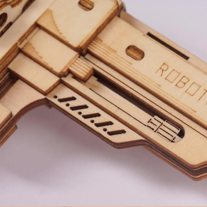 Dřevěné 3D puzzle revolveru Corsac od Robotime