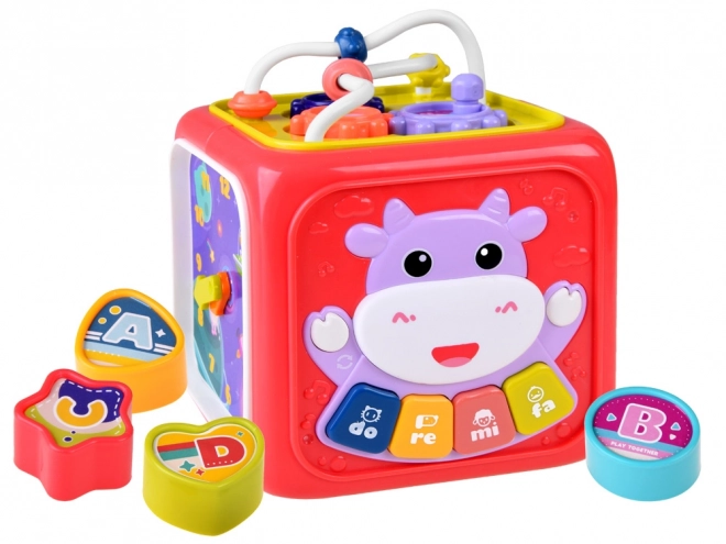 Interaktivní edukační kostka s pianem