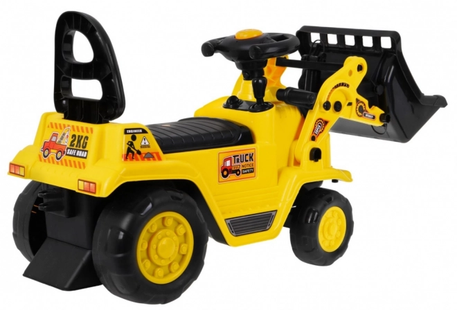 Dětský šlapací buldozer s helmou