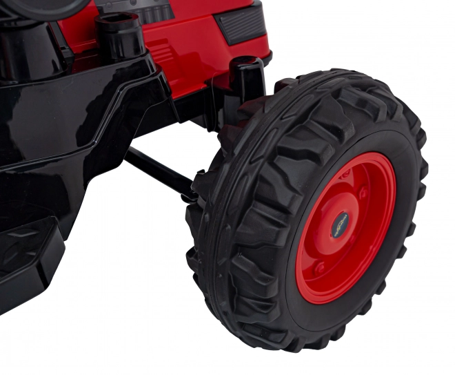 Dětský červený traktor a bagr na baterie s pohyblivou lžící