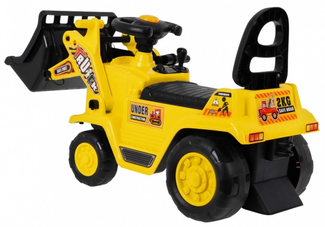 Dětský šlapací buldozer s helmou