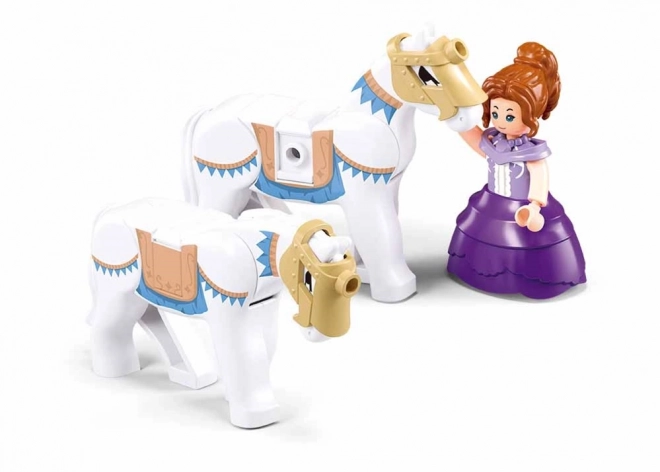 Obsahuje figurky a koňský tým
