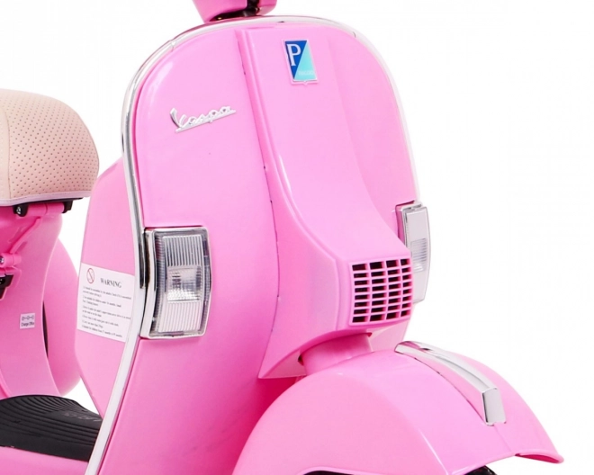 Elektrický dětský skútr Vespa růžový s podpůrnými kolečky