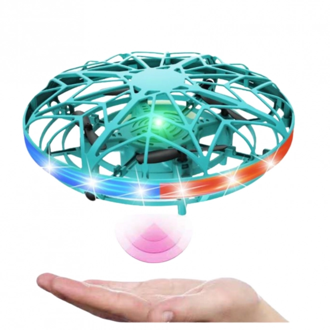 Dron UFO ovládaný rukou s LED světly tyrkysový
