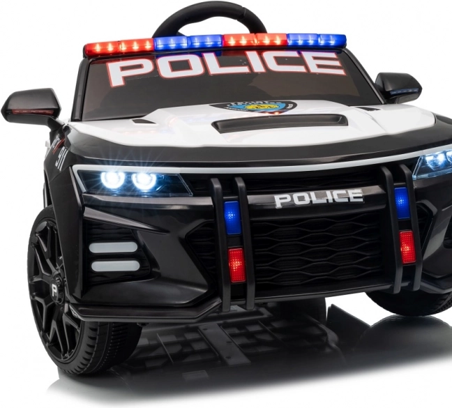 Černé policejní auto 911 Agentura