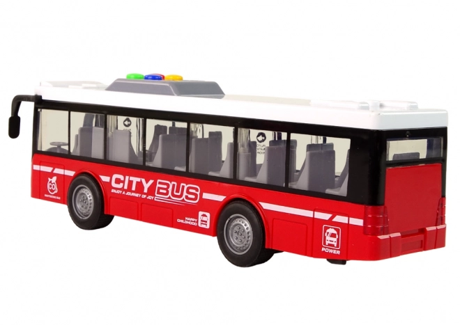 Interaktivní autobus zelený na baterie s frikčním pohonem 1:16 – Červený