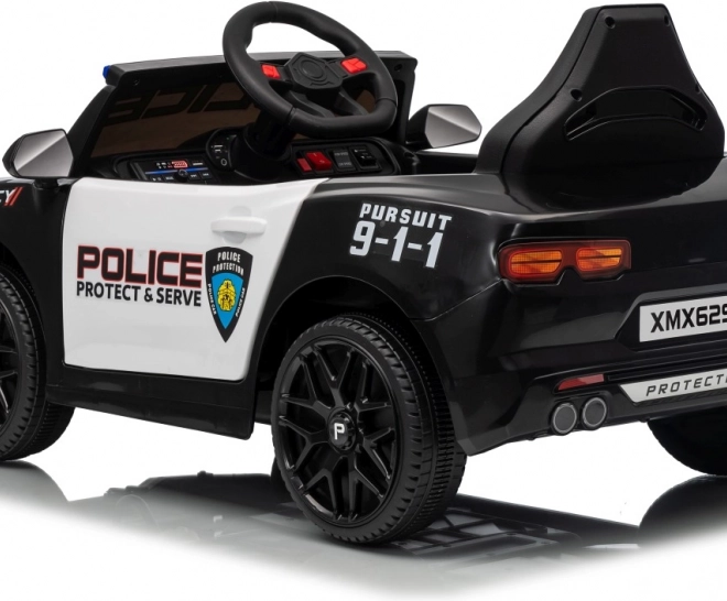 Černé policejní auto 911 Agentura
