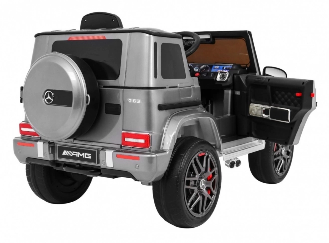 Mercedes AMG G63 pro děti Stříbrný lak + dálkové ovládání + MP3 LED + pomalý start + EVA + pásy