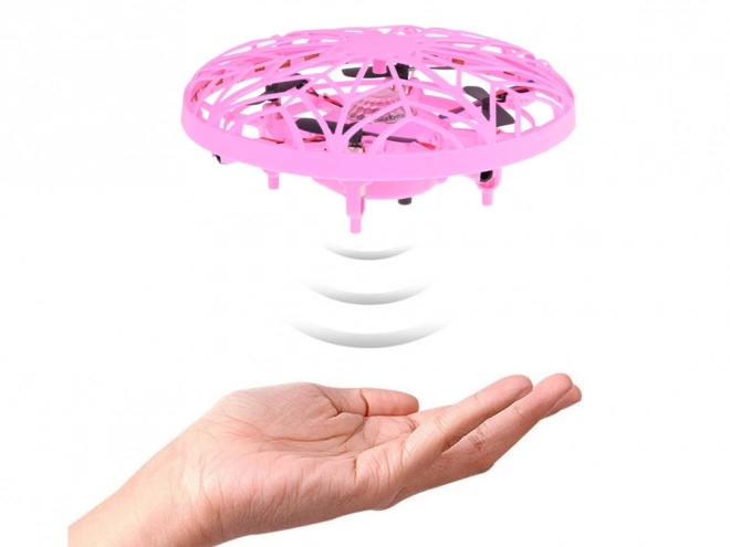 Létající disk s LED světlem ovládaný rukou
