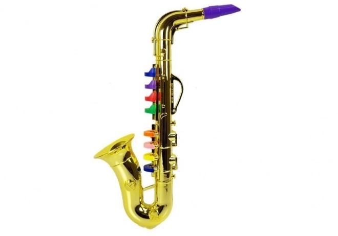 Saxofonový nástroj ve zlaté barvě