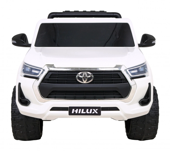 Toyota Hilux baterie pro děti Bílá + pohon 4x4 + dálkové ovládání + 2 nosiče zavazadel + rádio MP3 + LED dioda