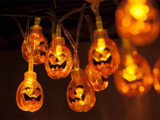 Závěsná LED dýňová girlanda na Halloween