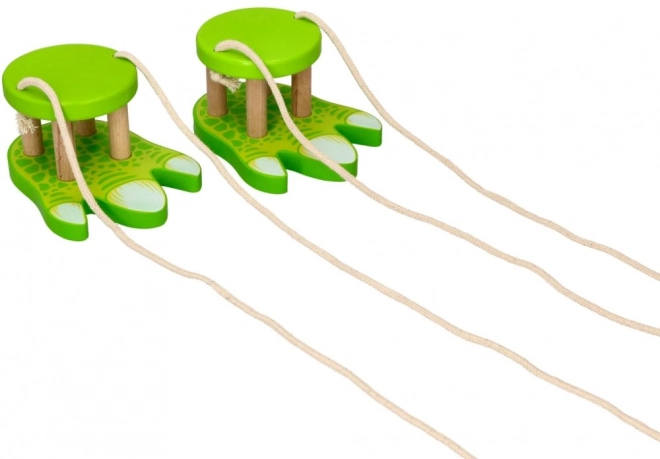 Dřeváky na chůdách na provázku dinosaura