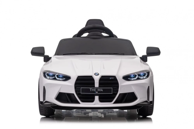 Elektrické auto BMW M4 bílé