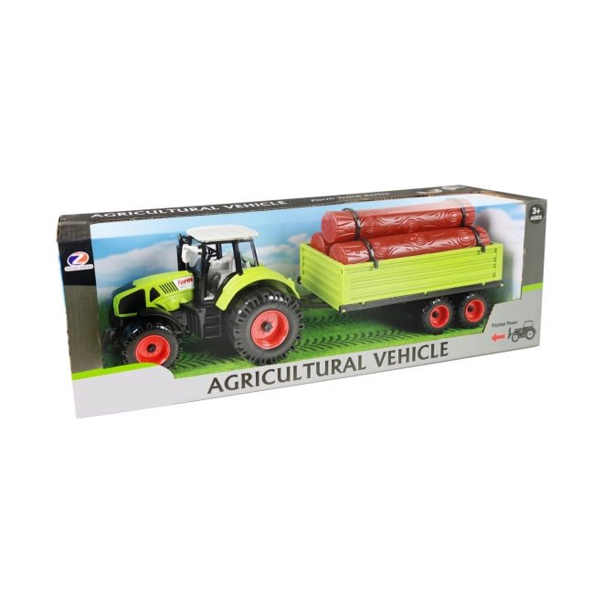 Traktor s přívěsem na dřevo