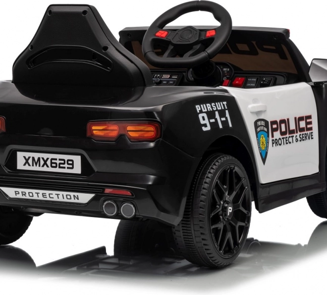 Černé policejní auto 911 Agentura