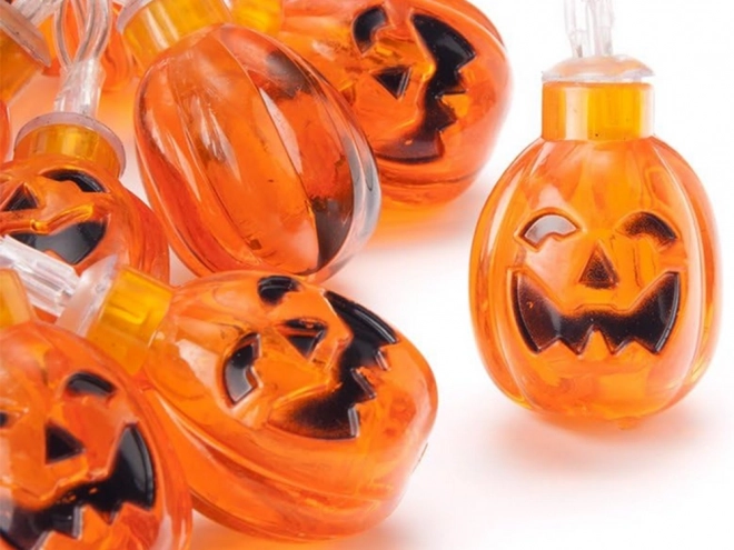Závěsná LED dýňová girlanda na Halloween