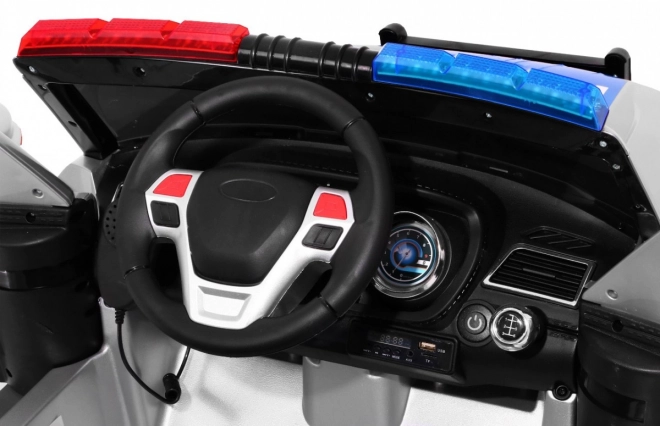 Dětské policejní auto SUV na baterie + sirény + světla + megafon + dálkové ovládání + pomalý start + EVA + samolepky