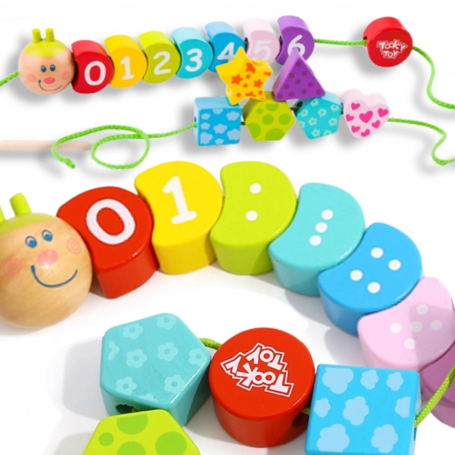 Dřevěná šněrovací housenka TOOKY TOY