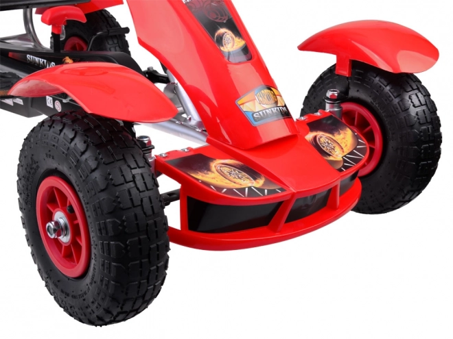Sportovní zelený šlapací motokára s nafukovacími koly