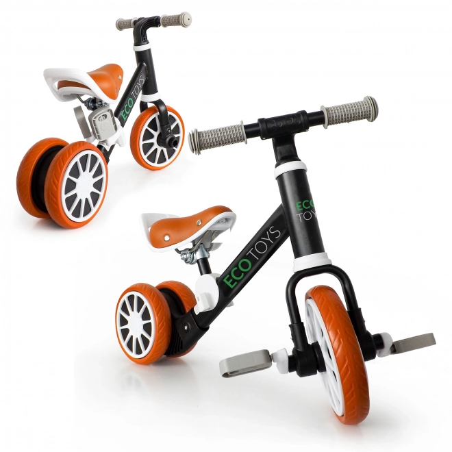 ECOTOYS Odrážedlo s odnímatelnými pedály černé