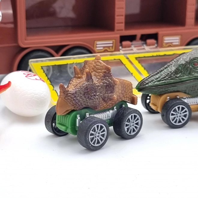 Dinosauří náklaďák s odpalovačem a autíčky