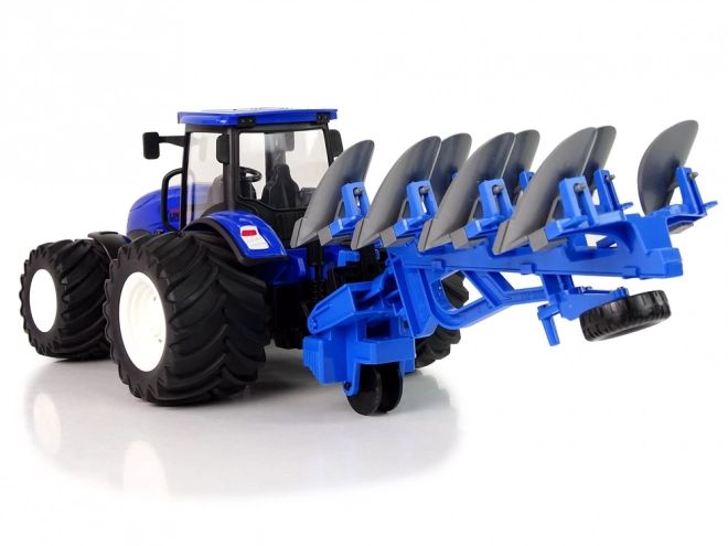 Traktor na dálkové ovládání 1:24 Modrý pluh kovový
