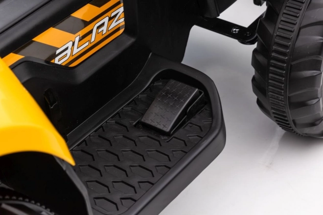 Elektrický traktor s lžící žlutý