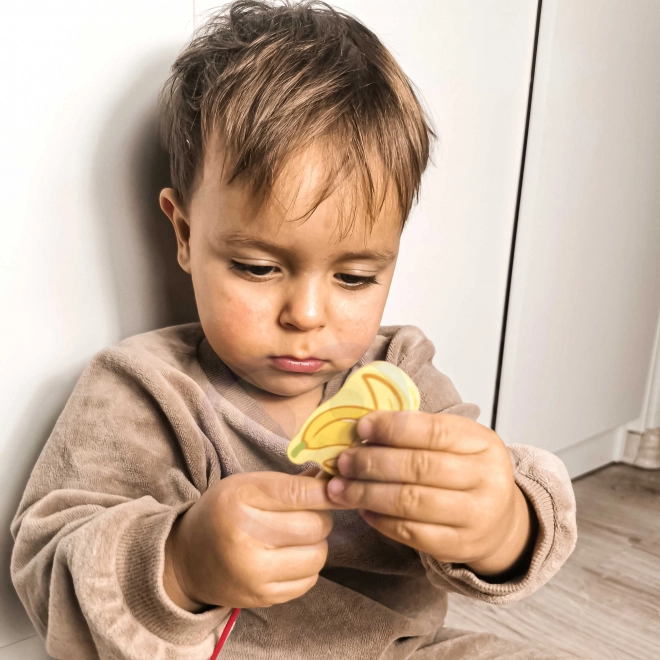 Dřevěné navlékací bloky s ovocem