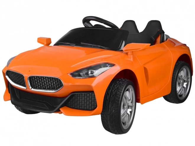 Dětské autíčko Bema Cabrio s efektem houpání – Oranžová