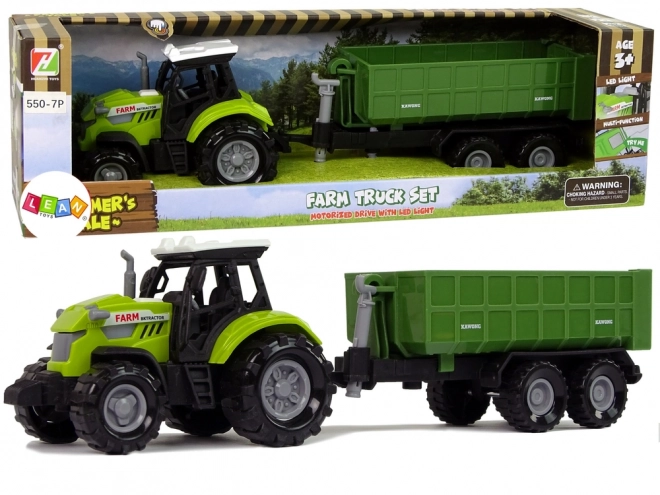 Traktor s odpojitelným přívěsem zelený