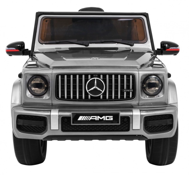 Mercedes AMG G63 pro děti Stříbrný lak + dálkové ovládání + MP3 LED + pomalý start + EVA + pásy