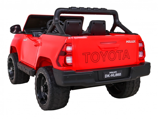 Toyota Hilux baterie pro děti Červená + pohon 4x4 + dálkové ovládání + 2 nosiče zavazadel + rádio MP3 + LED dioda