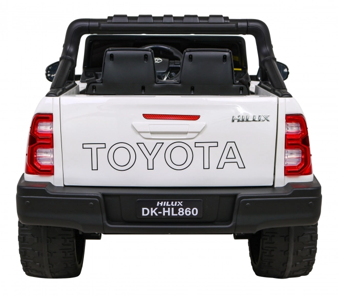 Toyota Hilux baterie pro děti Bílá + pohon 4x4 + dálkové ovládání + 2 nosiče zavazadel + rádio MP3 + LED dioda