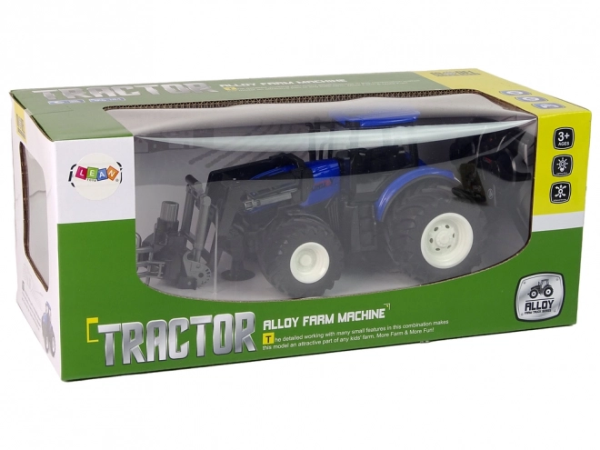 Dálkově ovládaný traktor s drapákem Blue