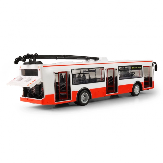 Trolejbus česky mluvící plast 29cm červený volný chod na bat. se světem se zvukem v krab. 33x11x10cm