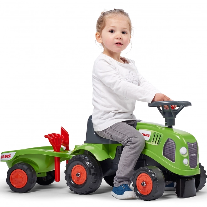 Odstrkovadlo traktor Claas zelené s volantem a valníkem