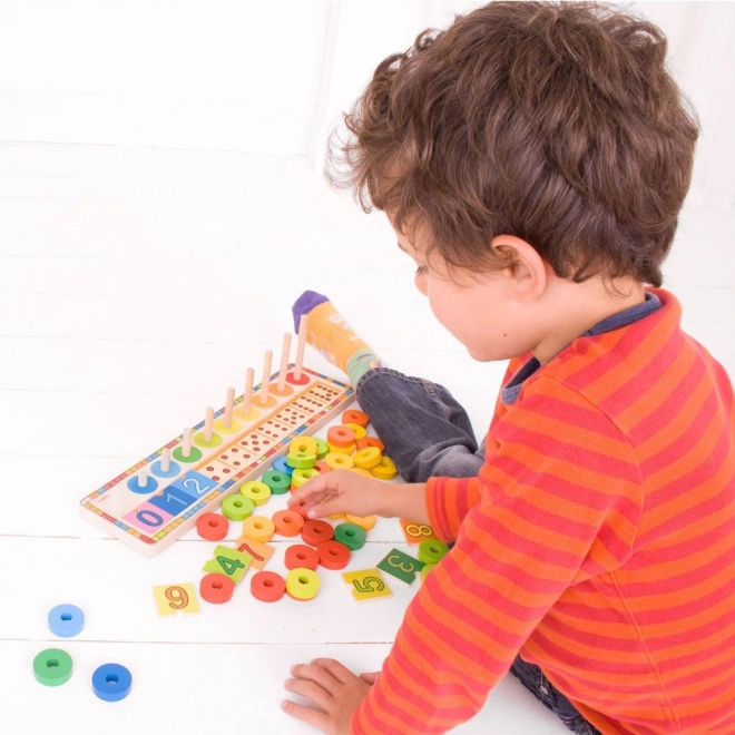 Bigjigs Toys dřevěná deska s číslovanými kroužky