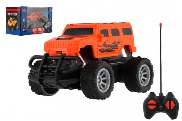 Avto RC mini tovornjak plast 12cm 27MHz na baterije s svetlobami v škatli 18x11,5x10cm – Oranžové