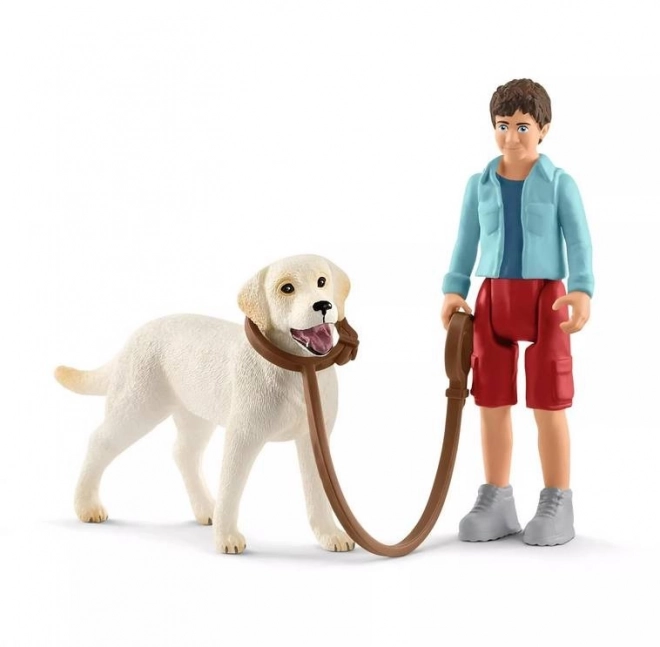 Schleich 42478 Spacer z psem rasy Labladar Retriever