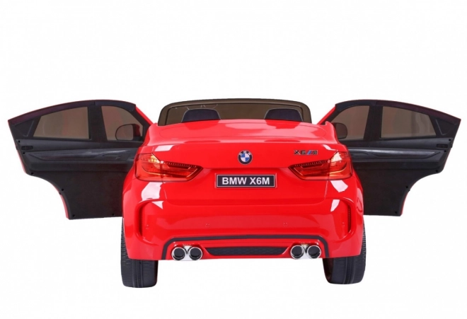 BMW X6M XXL pro 2 děti Červená + dálkové ovládání + eko kůže + bezpečnostní pásy + pomalý rozjezd + MP3 USB + LED dioda